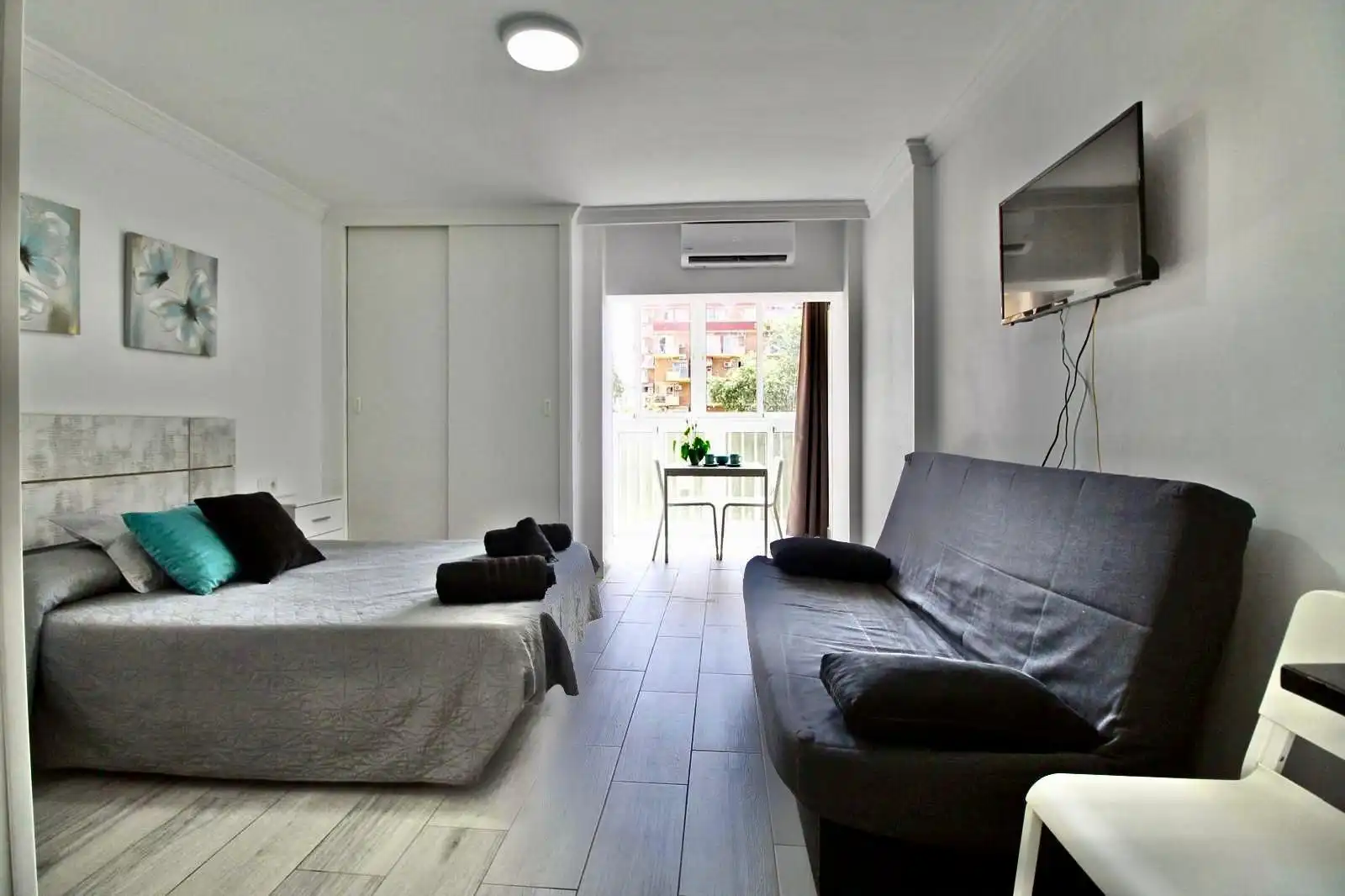 Schlafzimmer von Wohnung zum Verkauf in Benalmádena mit Klimaanlage, Privatgarten und Möbliert