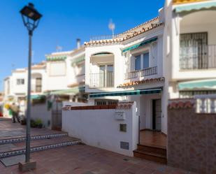 Vista exterior de Casa adosada en venda en Torrox amb Terrassa, Traster i Piscina comunitària