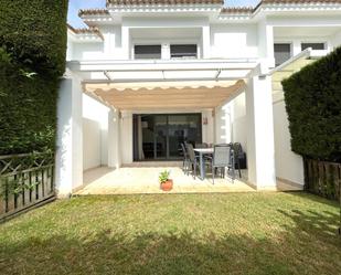 Garden of Single-family semi-detached to rent in El Rompido  with Air Conditioner