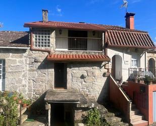 Vista exterior de Casa adosada en venda en Crecente amb Traster i Balcó