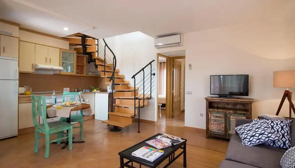 Sala d'estar de Casa adosada en venda en La Oliva amb Aire condicionat, Jardí privat i Terrassa