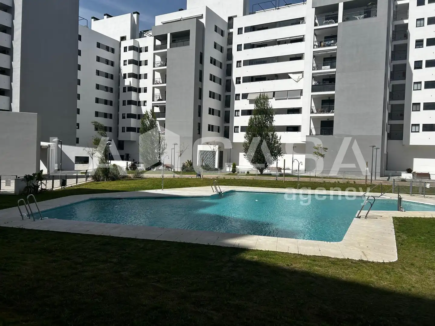 Swimming pool of Flat for sale in Dos Hermanas  with Air Conditioner, Terrace and Swimming Pool