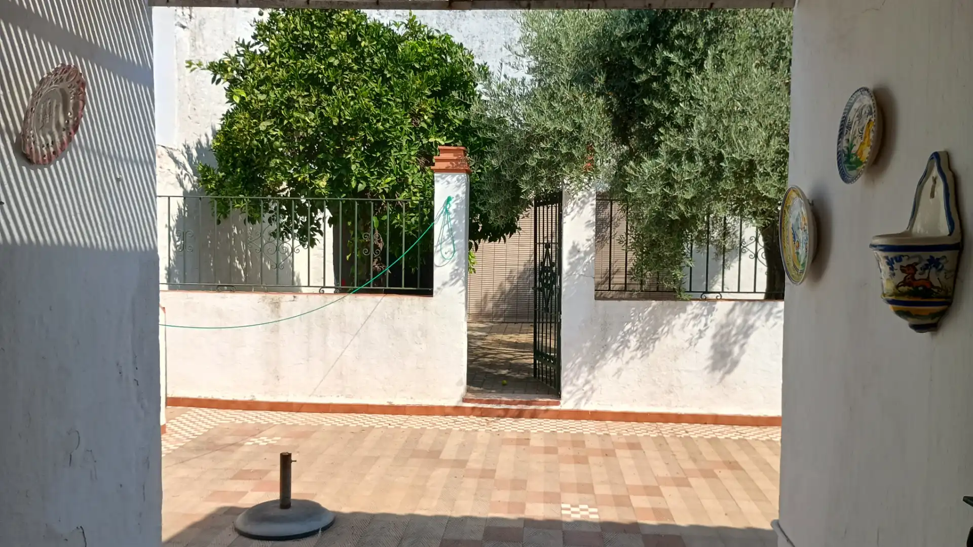 Garten von Einfamilien-Reihenhaus zur Miete in Villanueva del Ariscal mit Privatgarten, Ofen und Waschmaschine