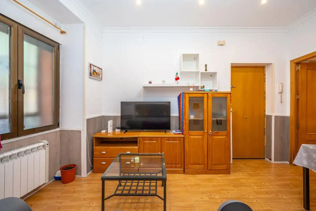 Sala d'estar de Planta baixa en venda en Madrid amb Calefacció, Terrassa i Moblat