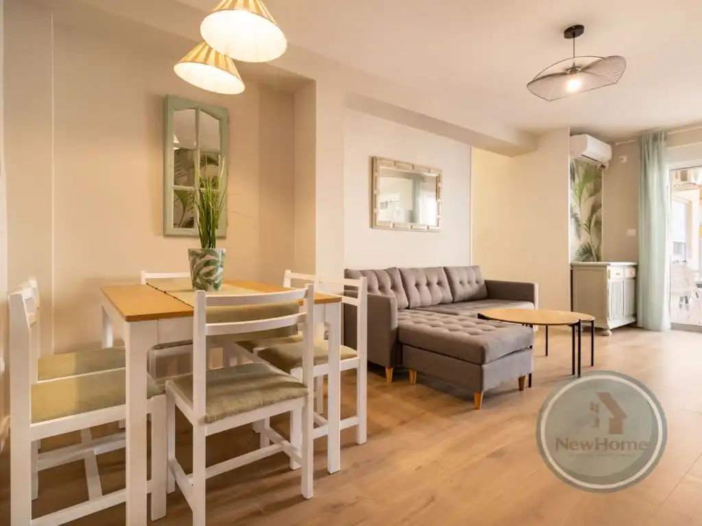 Sala d'estar de Pis de lloguer en Santa Pola amb Aire condicionat, Jardí privat i Moblat