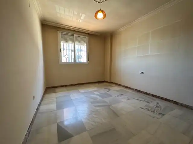 Habitación de Casa adosada en venta en Huelva con Aire acondicionado, Calefacción y Jardín privado