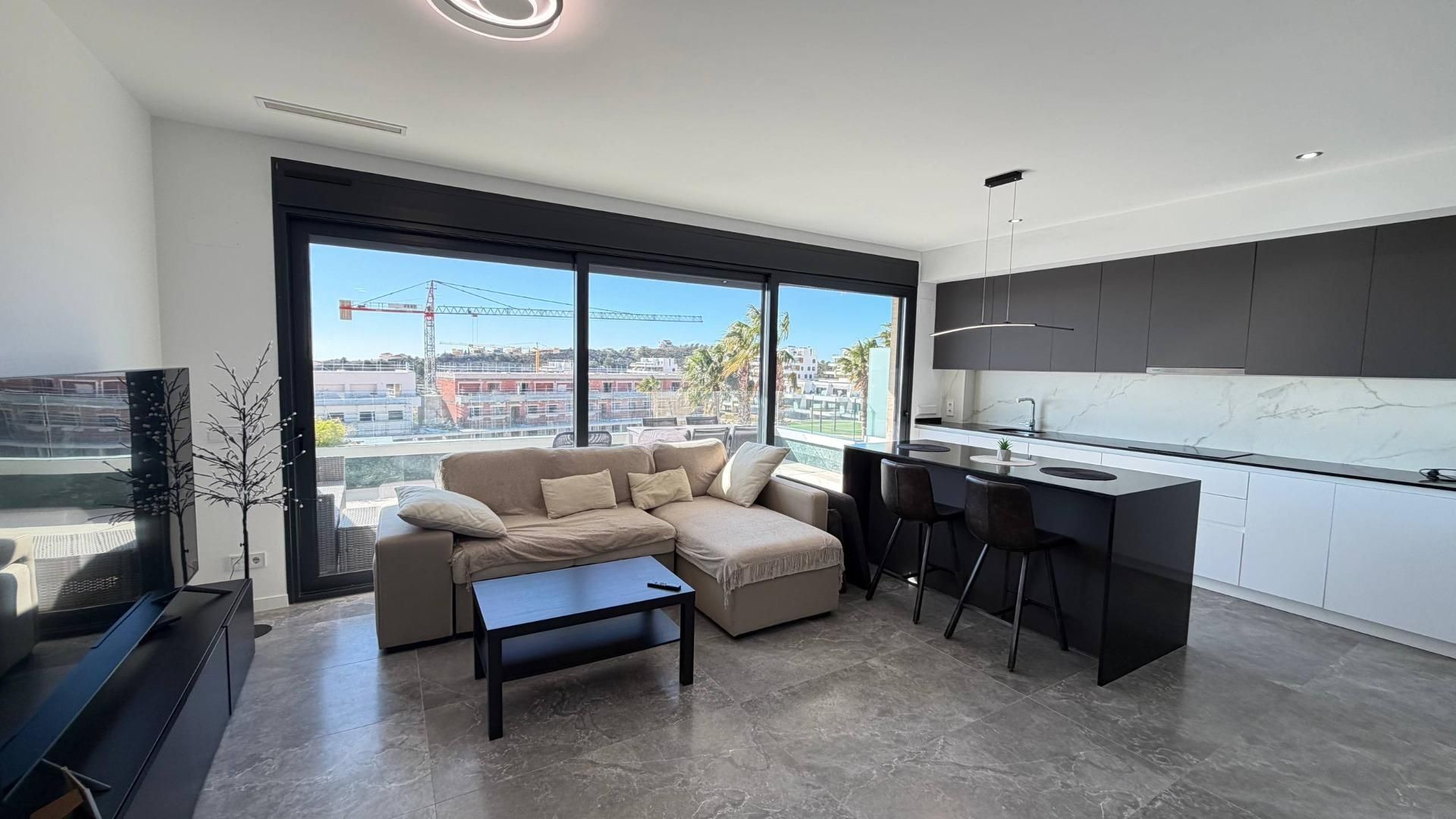 Sala d'estar de Apartament de lloguer en Finestrat amb Aire condicionat, Terrassa i Moblat