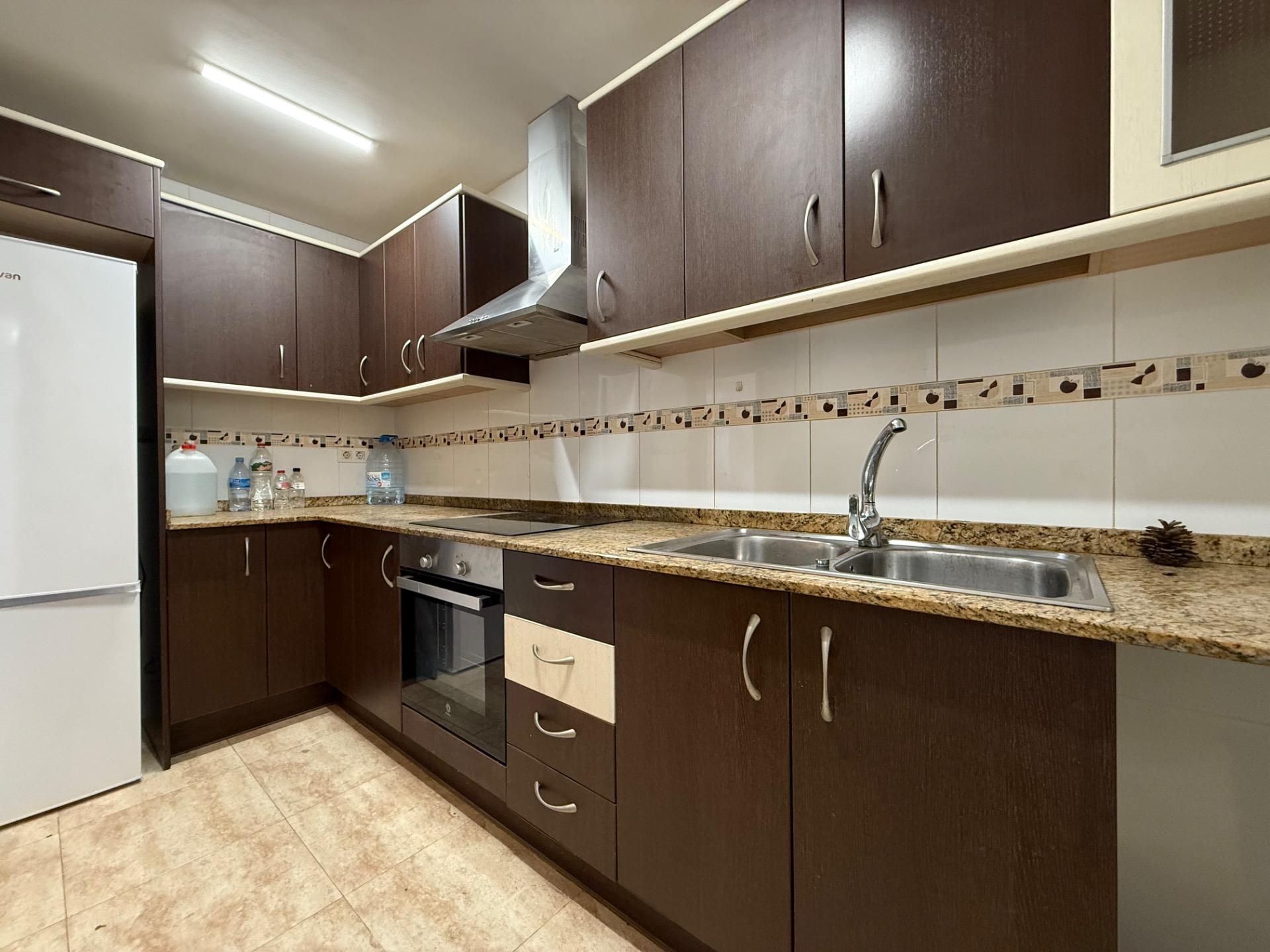 Cuina de Apartament en venda en L'Aldea amb Aire condicionat, Calefacció i Jardí privat