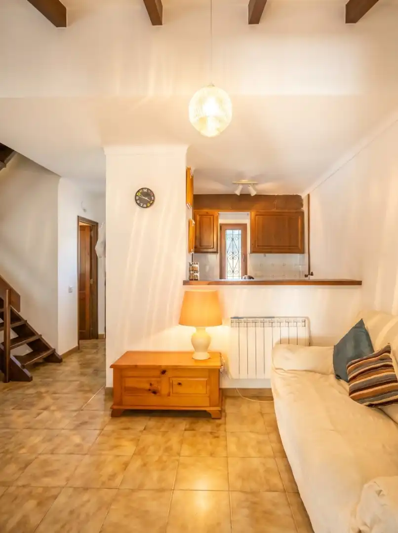 Sala d'estar de Dúplex en venda en L'Escala amb Aire condicionat, Calefacció i Jardí privat