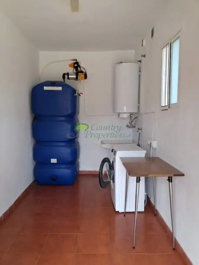 Cocina de Finca rústica en venta en Vélez-Málaga con Aire acondicionado, Jardín privado y Terraza