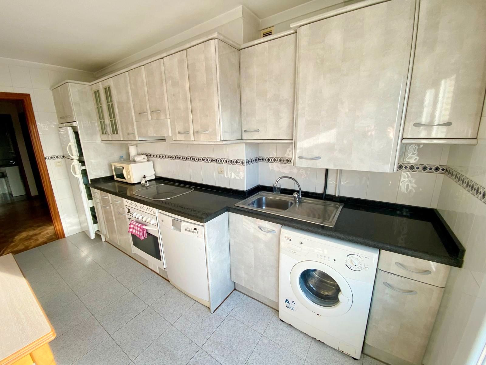 Kitchen of Flat to rent in Gijón   with Heating, Parquet flooring and Storage room