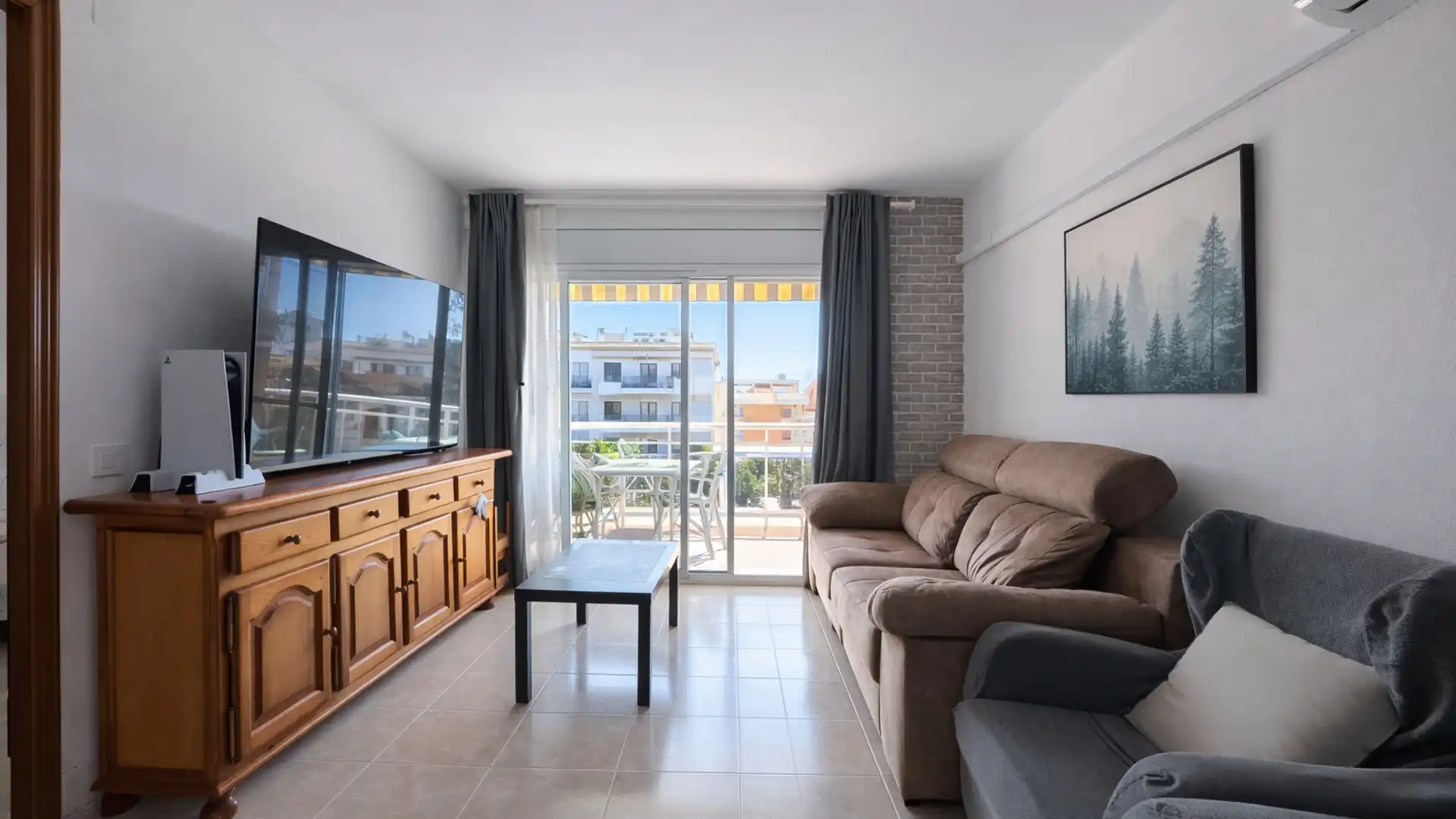 Wohnzimmer von Dachboden zum Verkauf in Cunit mit Klimaanlage, Heizung und Privatgarten