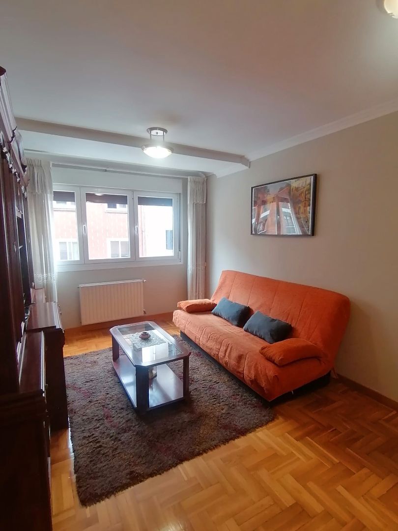 Living room of Apartment for sale in Gijón   with Heating, Parquet flooring and Storage room