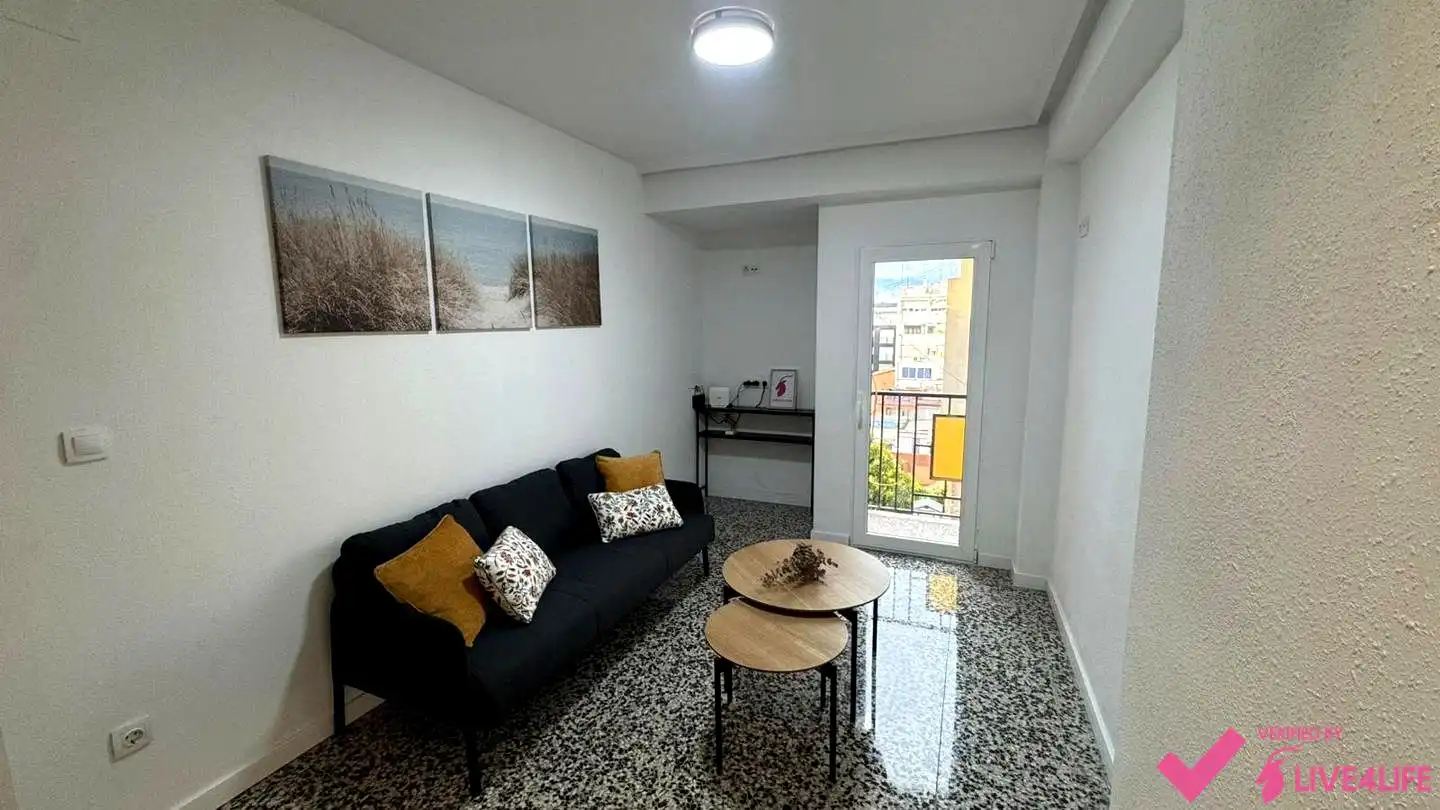 Sala de estar de Piso para compartir en Valencia con Calefacción y Amueblado