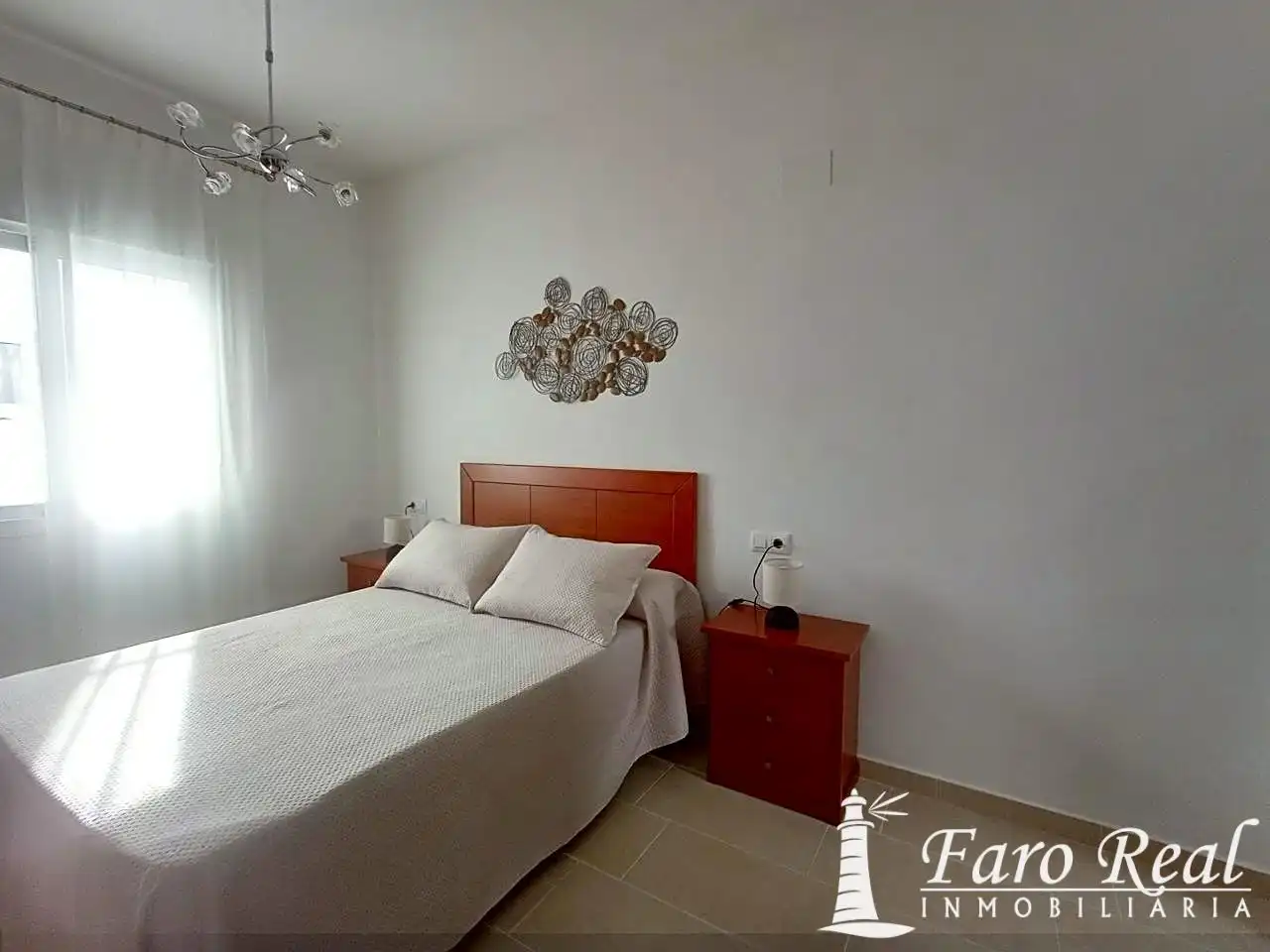 Dormitori de Apartament de lloguer en Sanlúcar de Barrameda amb Aire condicionat i Moblat