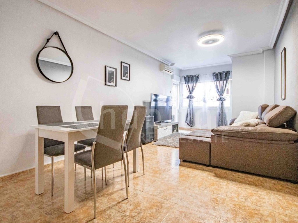 Sala d'estar de Apartament en venda en Los Montesinos amb Piscina comunitària