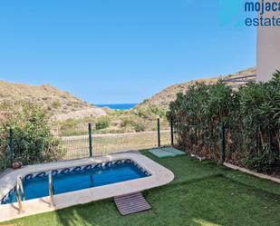 Swimming pool of Single-family semi-detached for sale in Mojácar  with Air Conditioner, Terrace and Swimming Pool