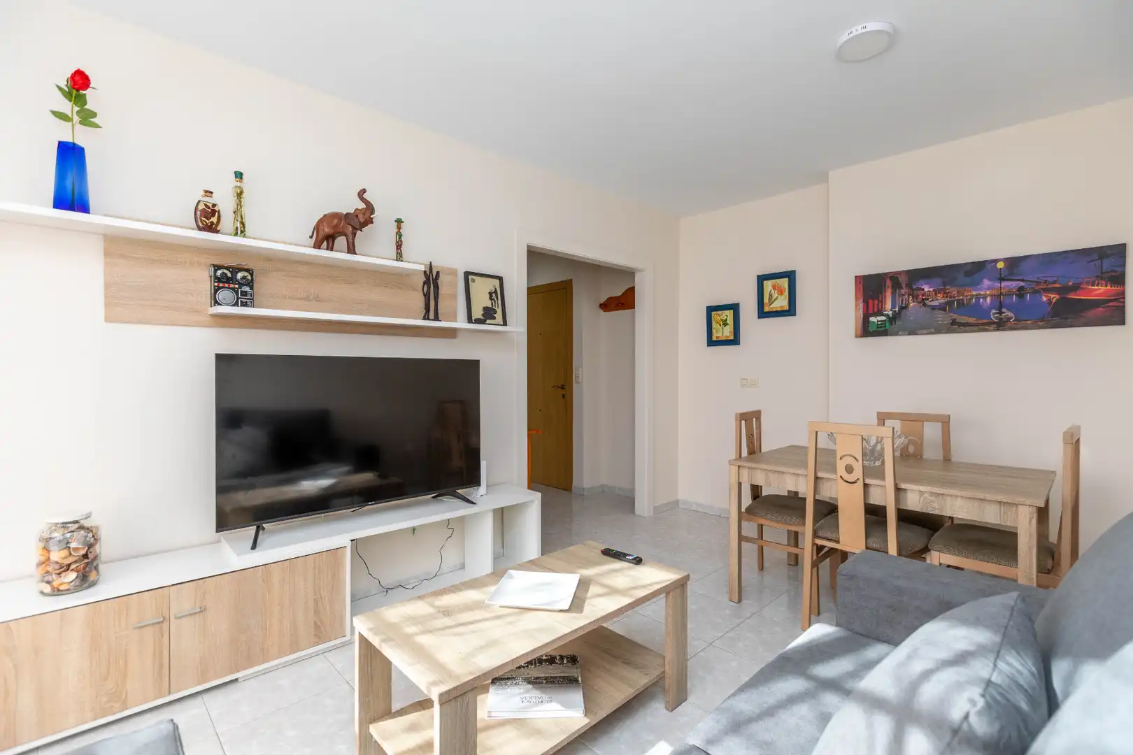 Sala d'estar de Apartament en venda en Sanxenxo amb Calefacció, Terrassa i Moblat