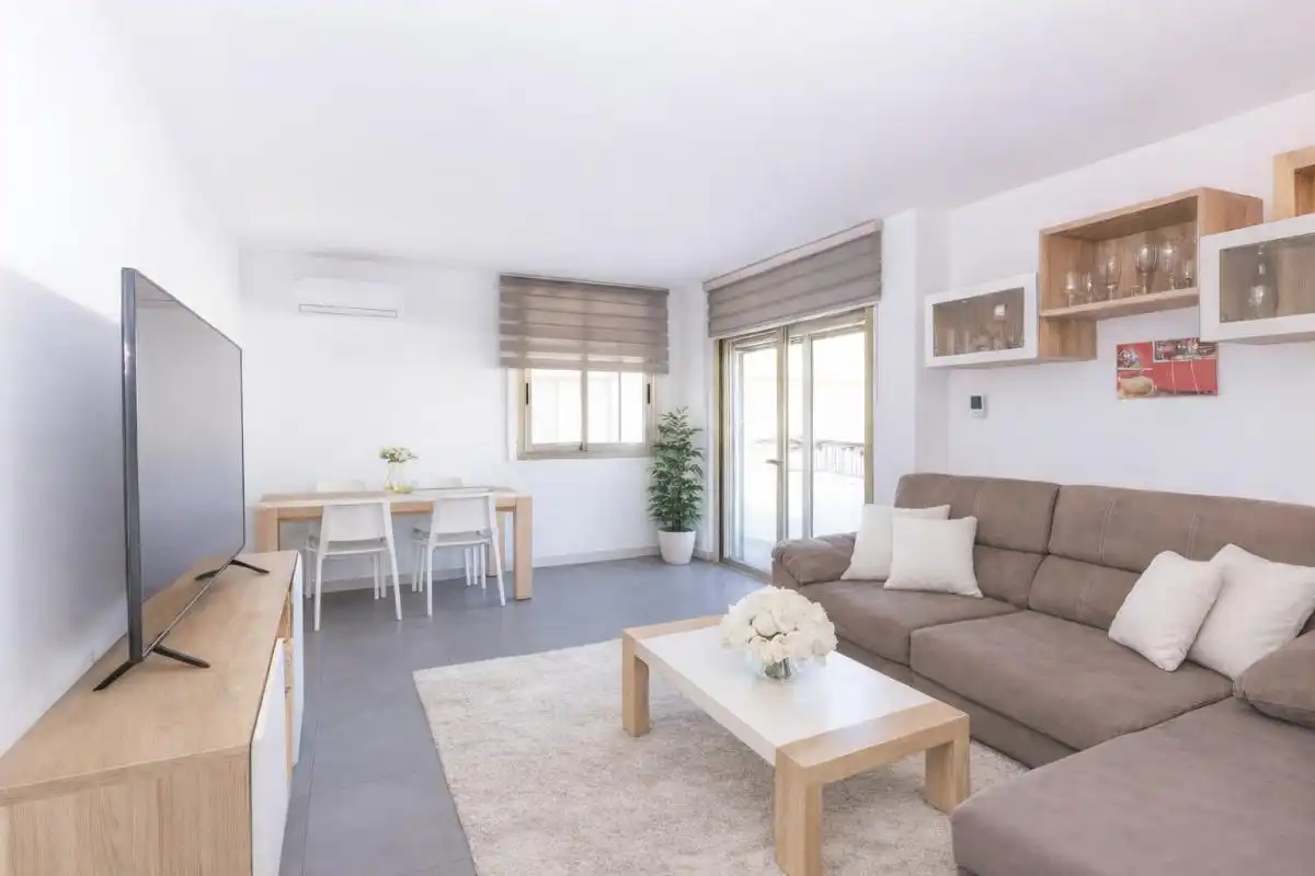 Sala de estar de Piso en venta en Sant Antoni de Portmany con Aire acondicionado, Calefacción y Amueblado