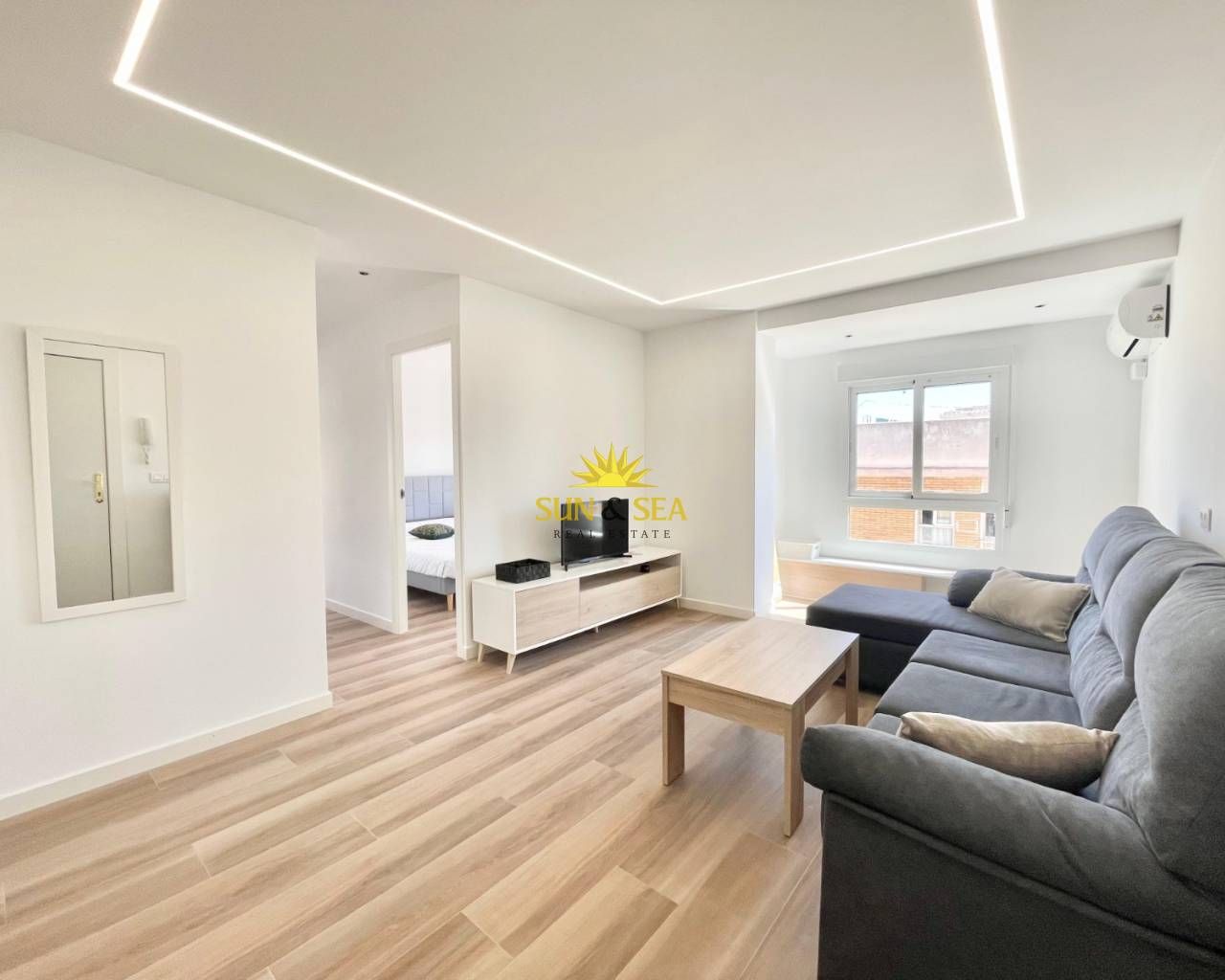Sala d'estar de Apartament de lloguer en Guardamar del Segura amb Moblat, Forn i Rentadora