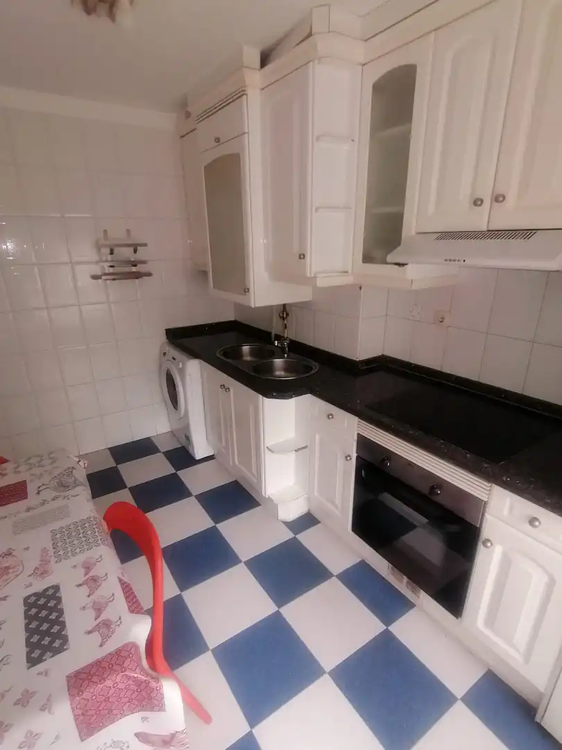 Kitchen of Flat for rent in Gijón   with Heating, Parquet flooring and Storage room