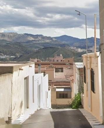 Vista exterior de Casa adosada en venda en Olula del Río amb Jardí privat