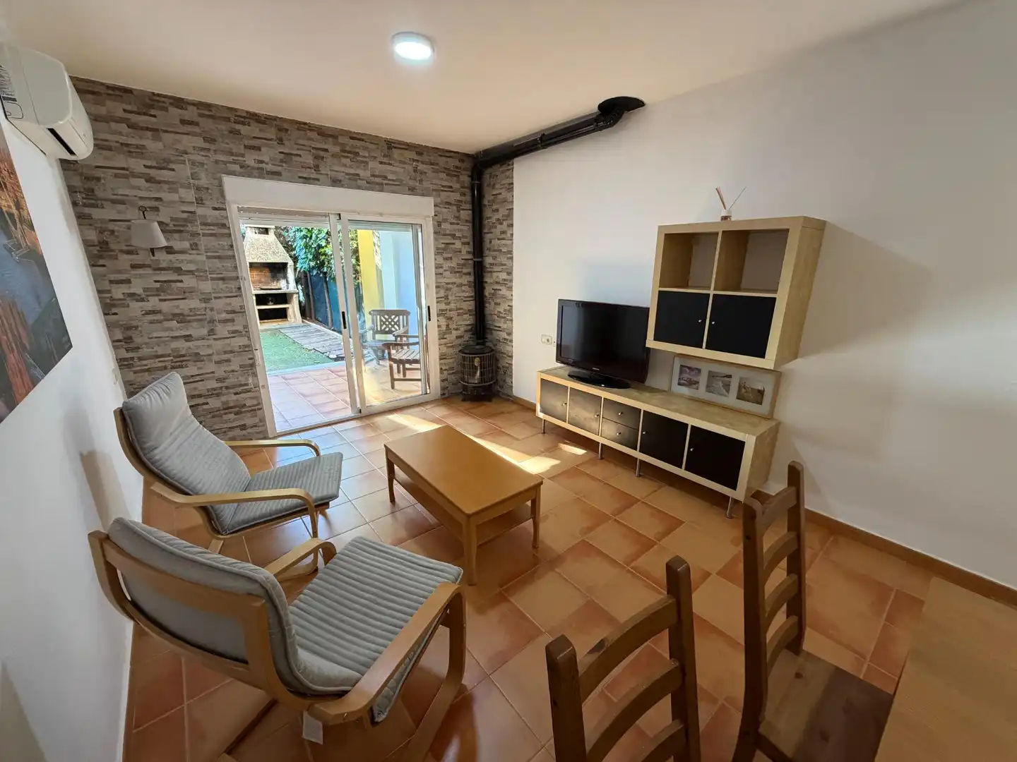 Wohnzimmer von Einfamilien-Reihenhaus zum Verkauf in Dénia mit Klimaanlage, Privatgarten und Terrasse