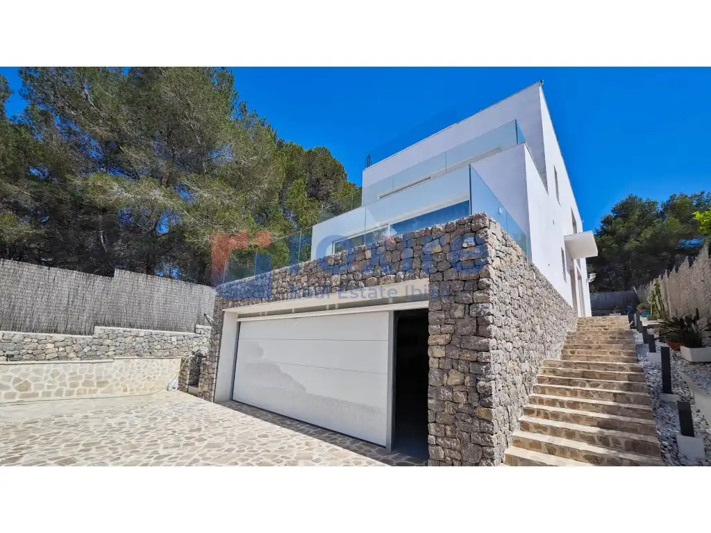 Vista exterior de Casa o xalet en venda en Santa Eulària des Riu amb Aire condicionat, Jardí privat i Terrassa