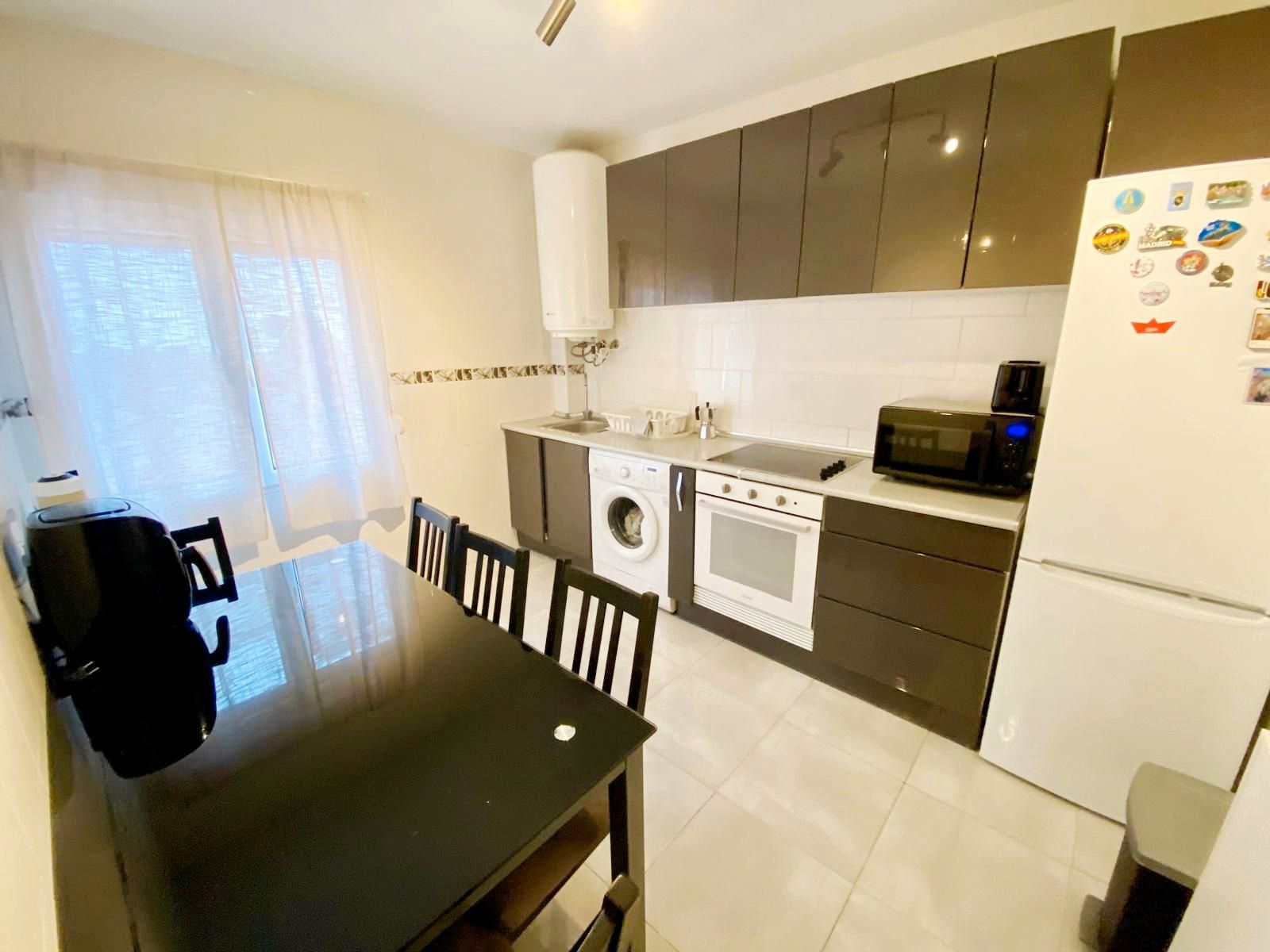 Kitchen of Flat for sale in Gijón   with Heating, Parquet flooring and Oven