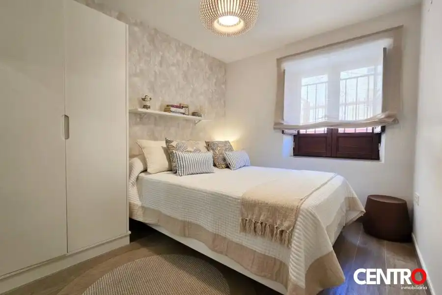 Dormitori de Apartament de lloguer en Granada amb Aire condicionat
