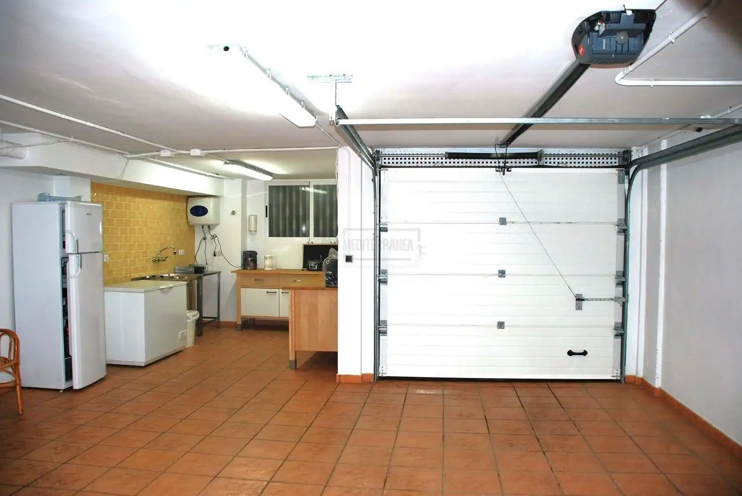 Küche von Einfamilien-Reihenhaus zum Verkauf in Gandia mit Klimaanlage, Terrasse und Abstellraum
