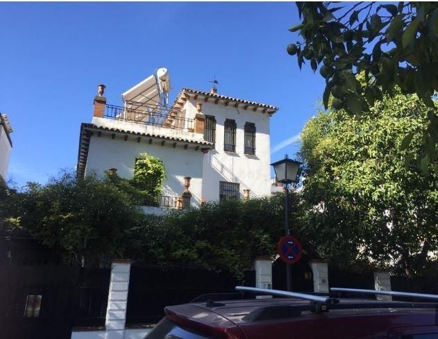 Exterior view of House or chalet for sale in  Sevilla Capital  with Private garden, Storage room and Community pool