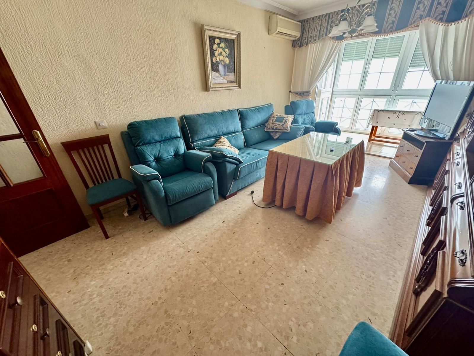 Living room of Flat for sale in Punta Umbría  with Air Conditioner, Furnished and Balcony