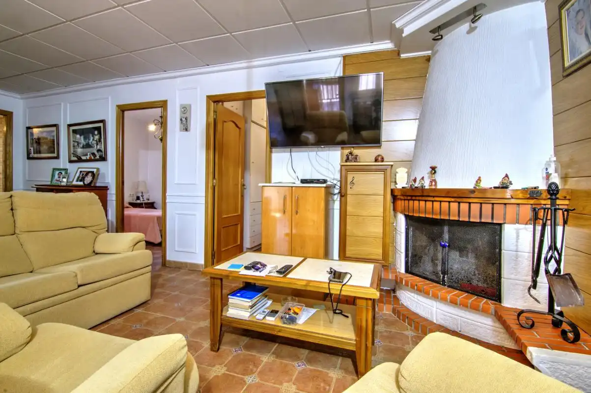 Sala d'estar de Casa o xalet en venda en Alicante / Alacant amb Aire condicionat, Calefacció i Jardí privat