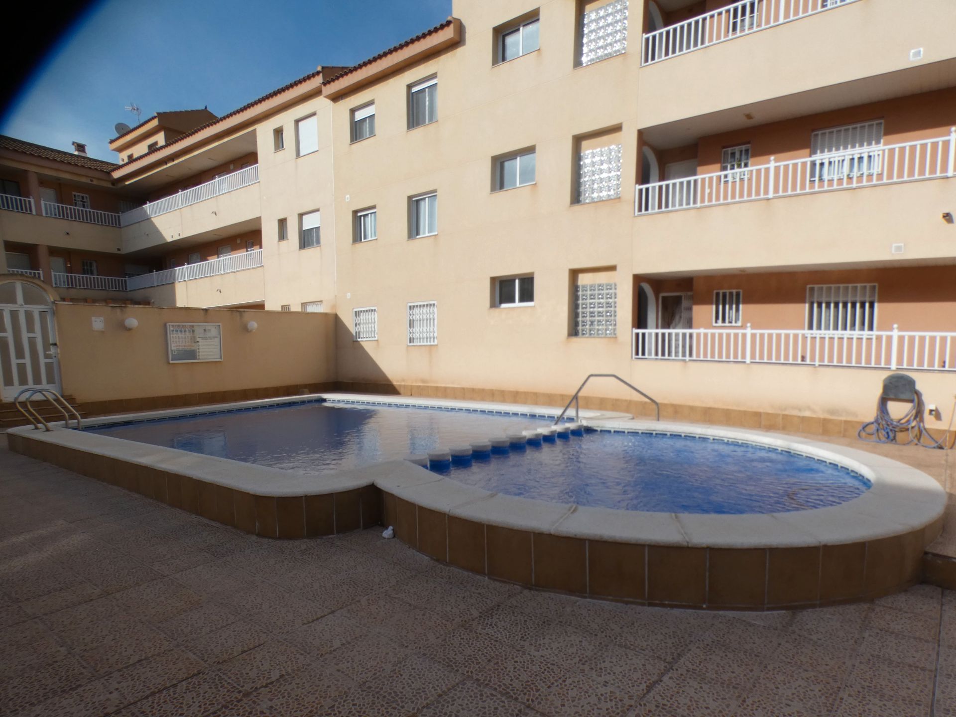 Swimming pool of Flat for sale in Los Alcázares  with Air Conditioner, Heating and Storage room