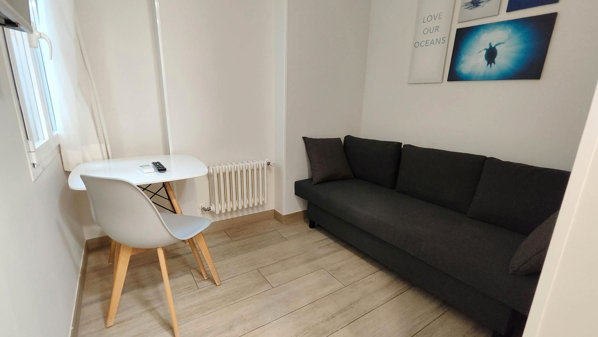 Sala de estar de Piso de alquiler en  Madrid Capital con Aire acondicionado, Calefacción y Amueblado