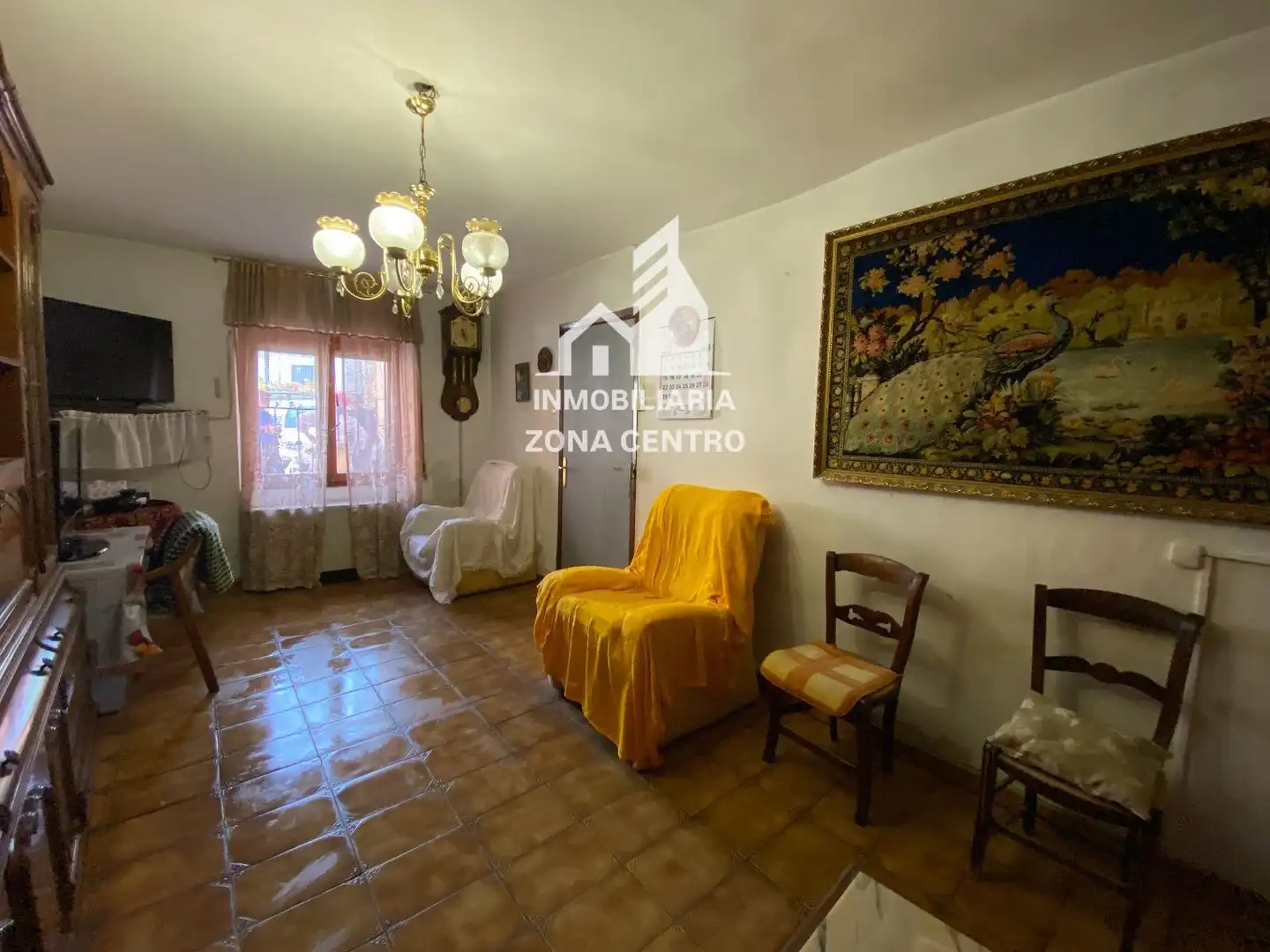 Sala de estar de Casa adosada en venta en Baltanás con Calefacción, Jardín privado y Amueblado