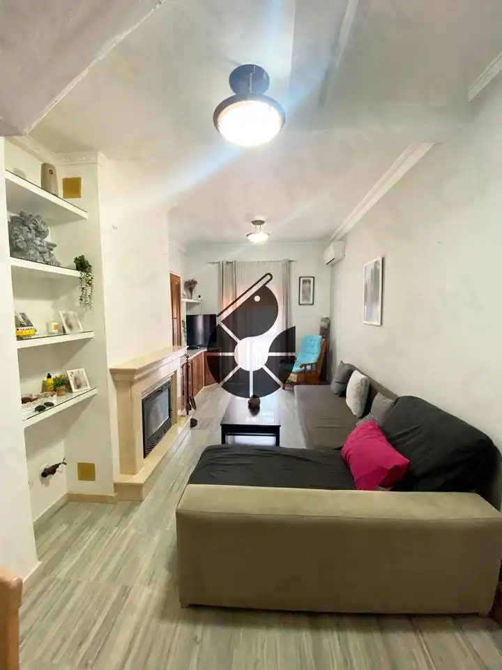 Sala de estar de Casa adosada en venta en Bormujos con Aire acondicionado, Terraza y Trastero