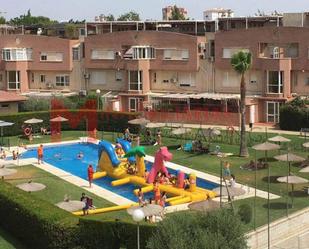 Swimming pool of Duplex for sale in  Sevilla Capital  with Air Conditioner, Heating and Parquet flooring