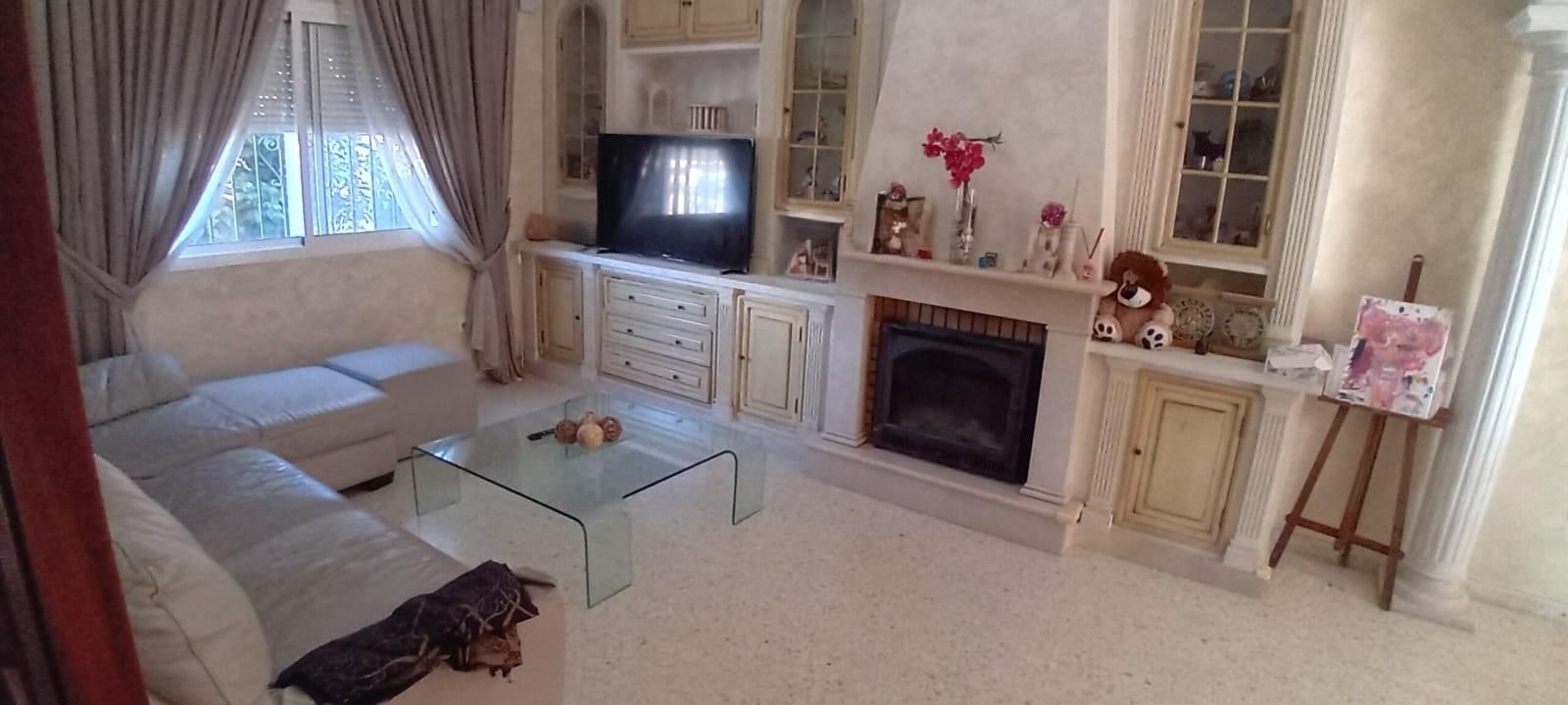Sala de estar de Casa adosada en venta en Algeciras con Jardín privado, Trastero y Jacuzzi