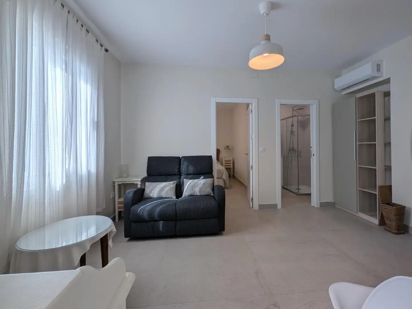 Sala d'estar de Apartament de lloguer en Sevilla amb Aire condicionat i Moblat