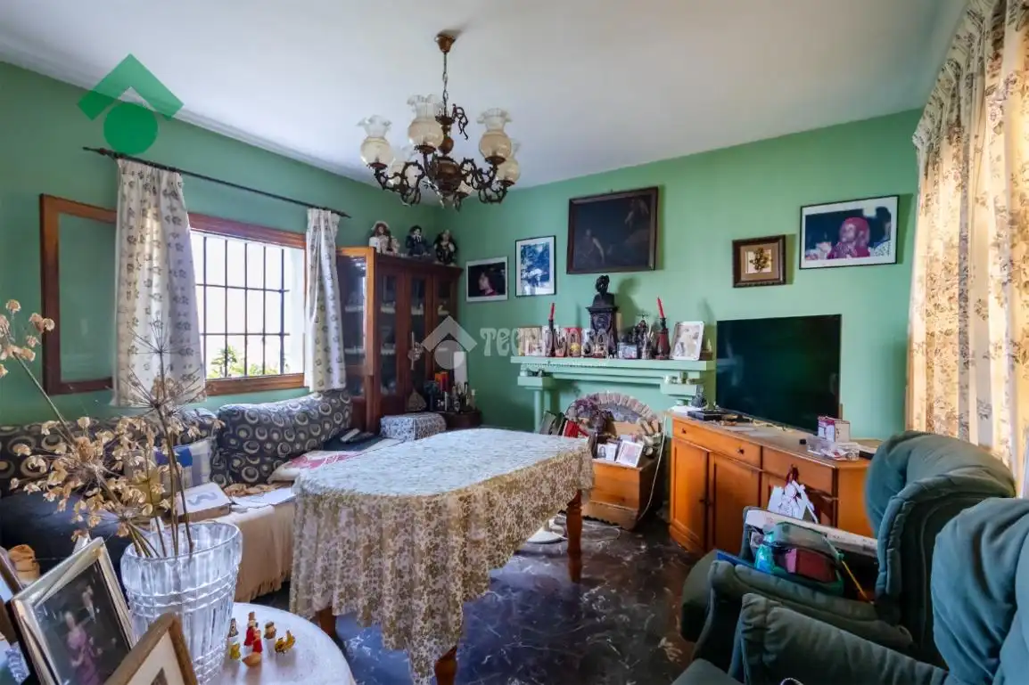 Sala de estar de Casa adosada en venta en Nerja con Jardín privado