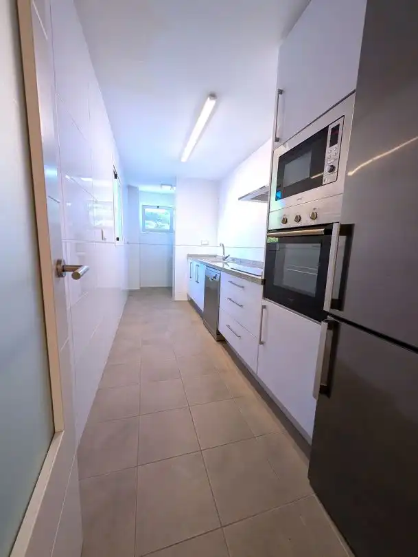 Cuina de Apartament de lloguer en La Alcaidesa amb Aire condicionat, Calefacció i Jardí privat