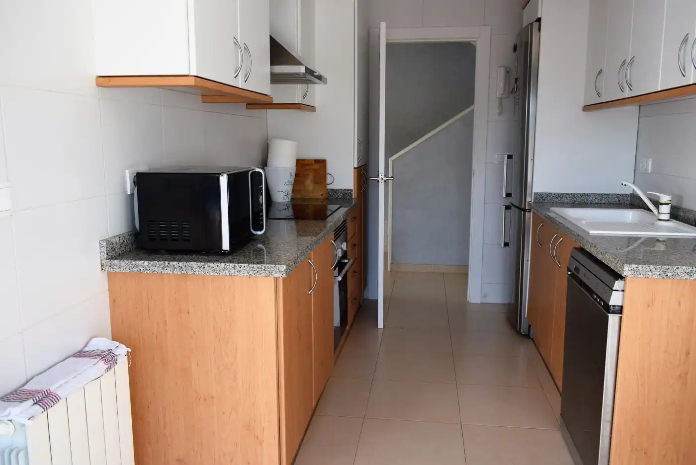 Cuina de Casa adosada en venda en Calafell amb Calefacció, Jardí privat i Terrassa