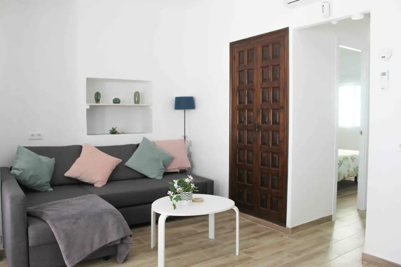Sala d'estar de Casa adosada en venda en Vélez-Málaga amb Aire condicionat, Terrassa i Moblat