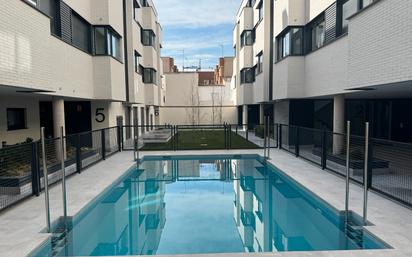 Swimming pool of Flat for sale in  Madrid Capital  with Air Conditioner, Heating and Parquet flooring