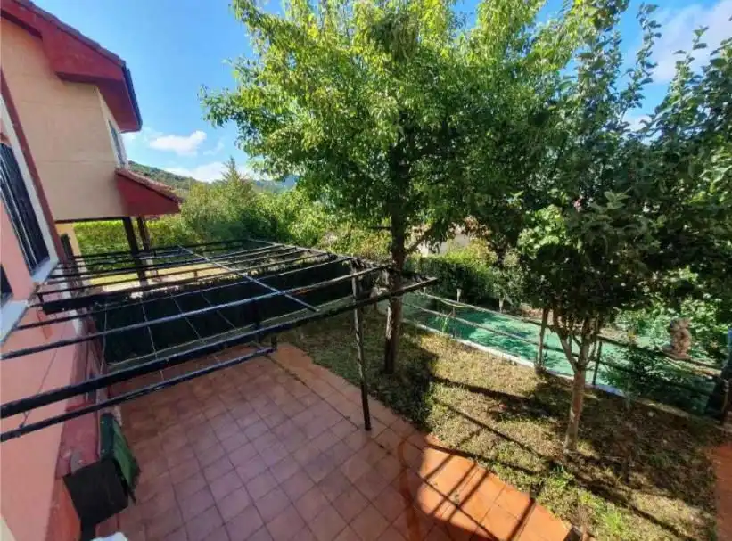Garden of Houses for sale in Riaño  with Air Conditioner, Heating and Storage room