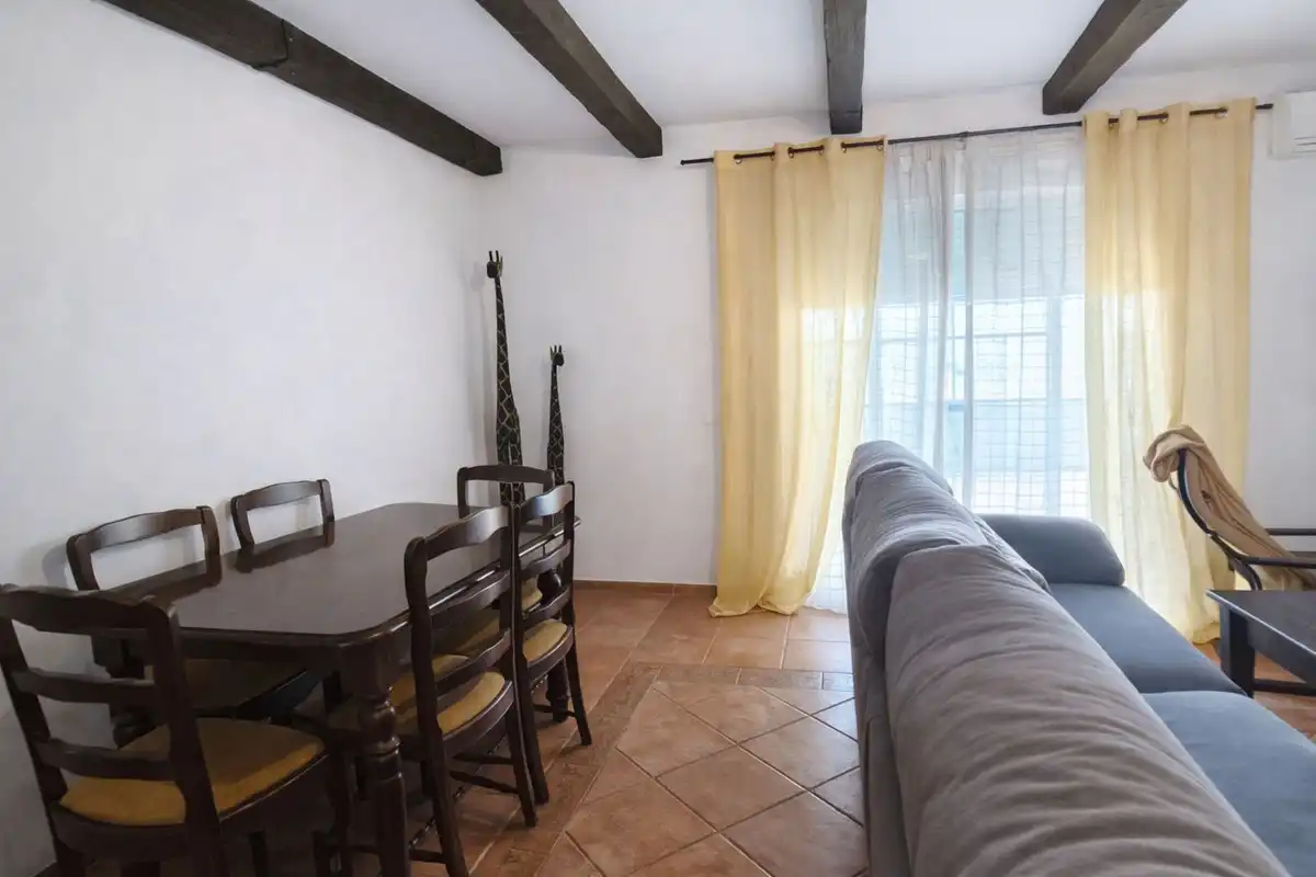 Menjador de Casa adosada en venda en San Roque amb Aire condicionat, Jardí privat i Terrassa