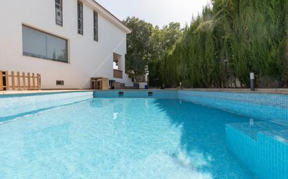 Swimming pool of Single-family semi-detached for sale in Atarfe  with Air Conditioner and Swimming Pool