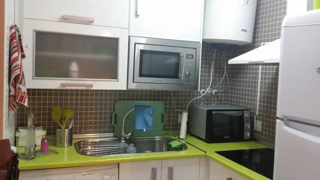 Küche von Wohnung zum Verkauf in Almería mit Klimaanlage und Möbliert